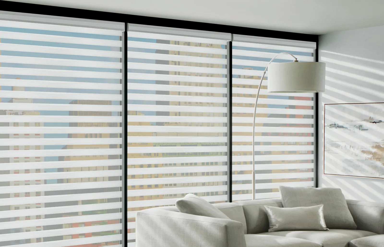 Dual shades adjusted for daytime privacy in a living room