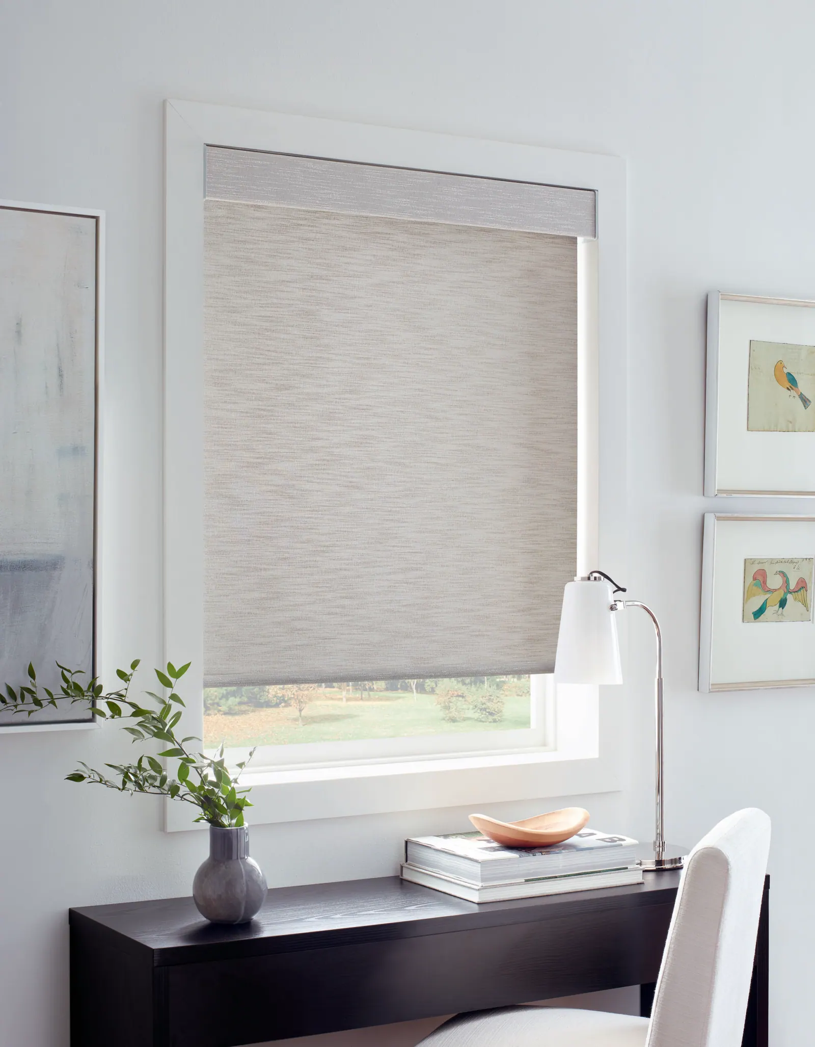 Burlap-texture roller shades inside-mounted in a living room