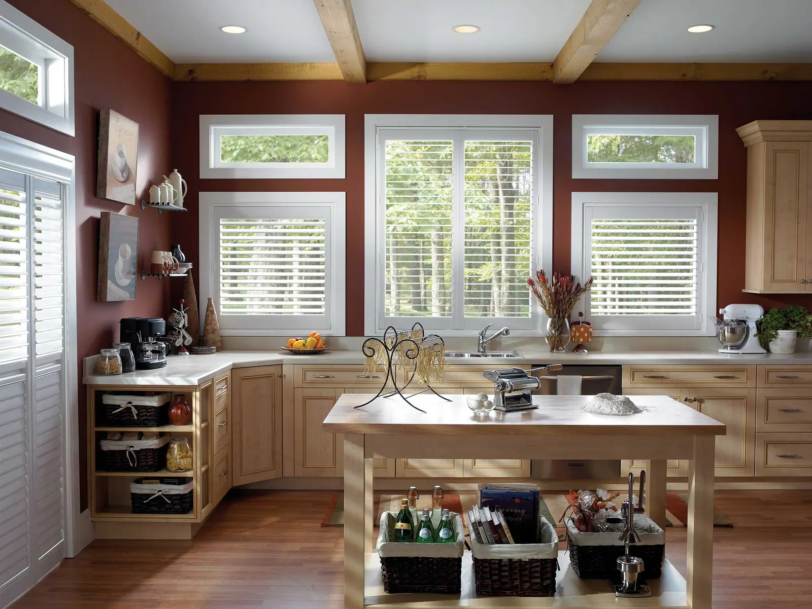 Cotton-white shutters over a kitchen sink window