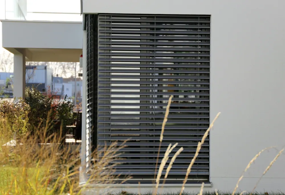 Exterior shutters on a commercial building facade