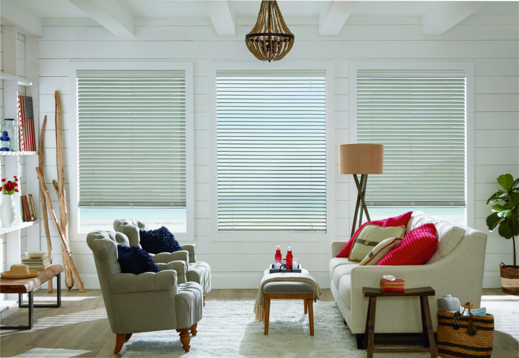 three windows of blinds